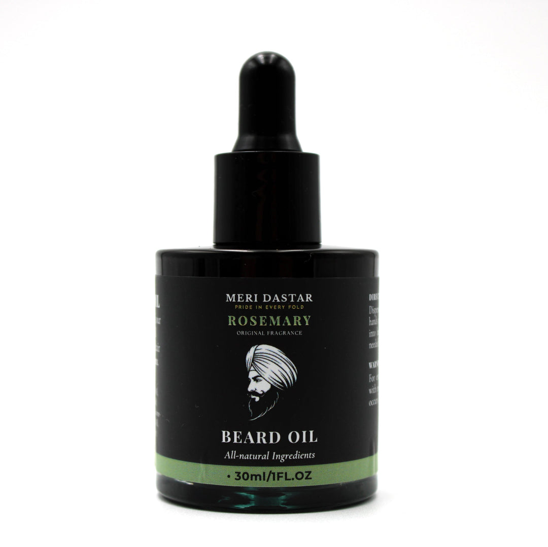Bottle of Meri Dastar Rosemary Beard Oil on a white background